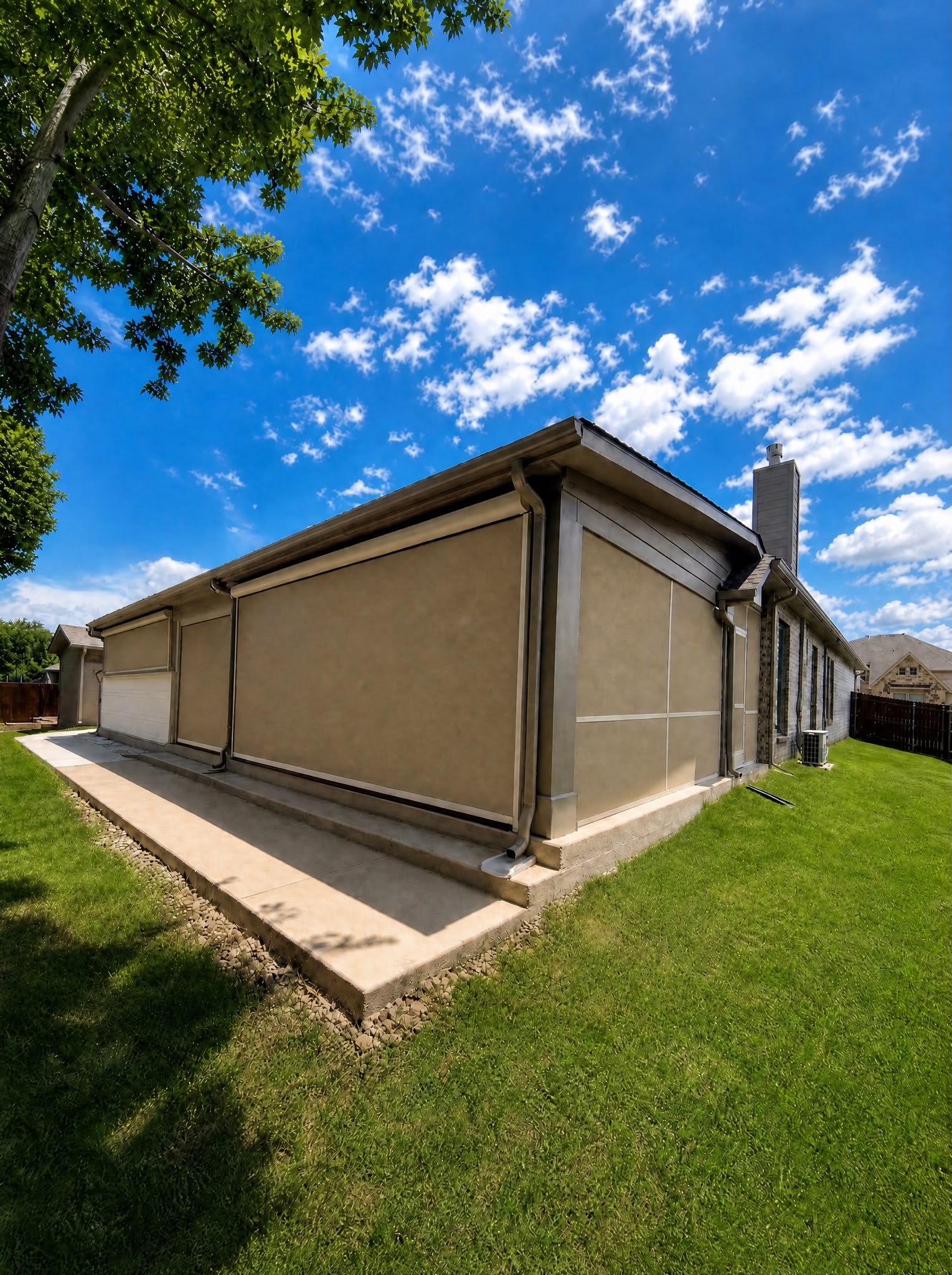Shade Doctor motorized screens installed on DFW home