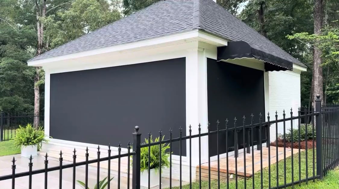 Black motorized screens on home